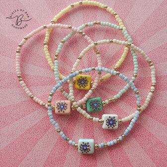 armband pastel effen bedel